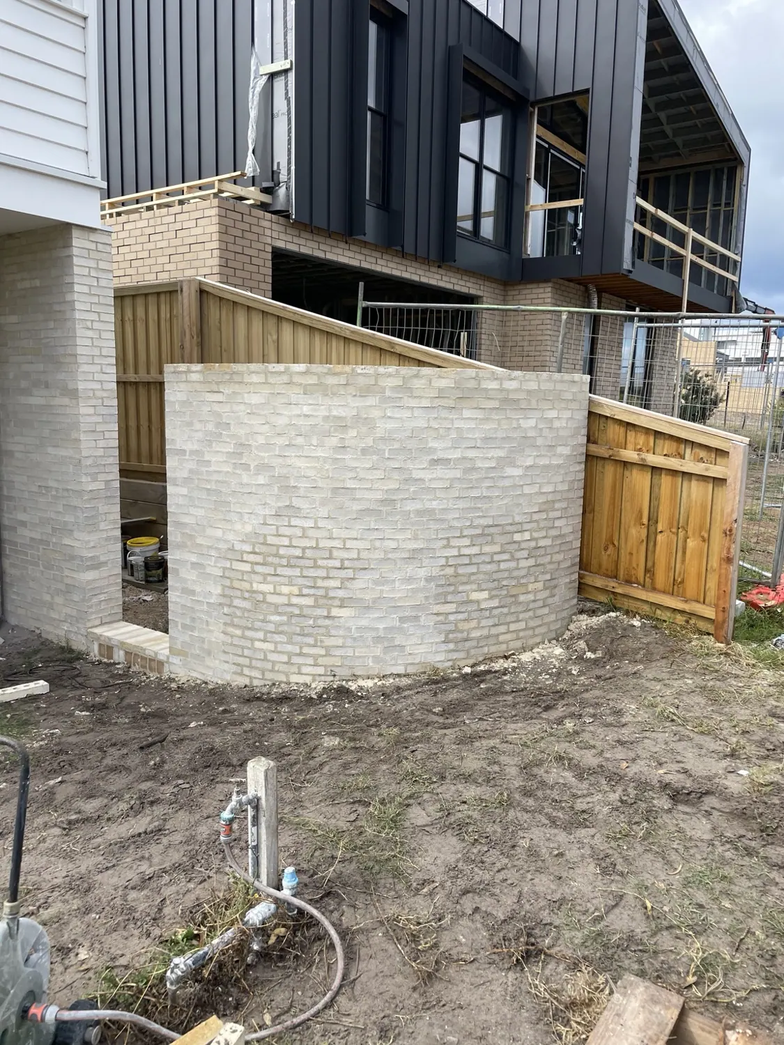 Curved feature brick wall