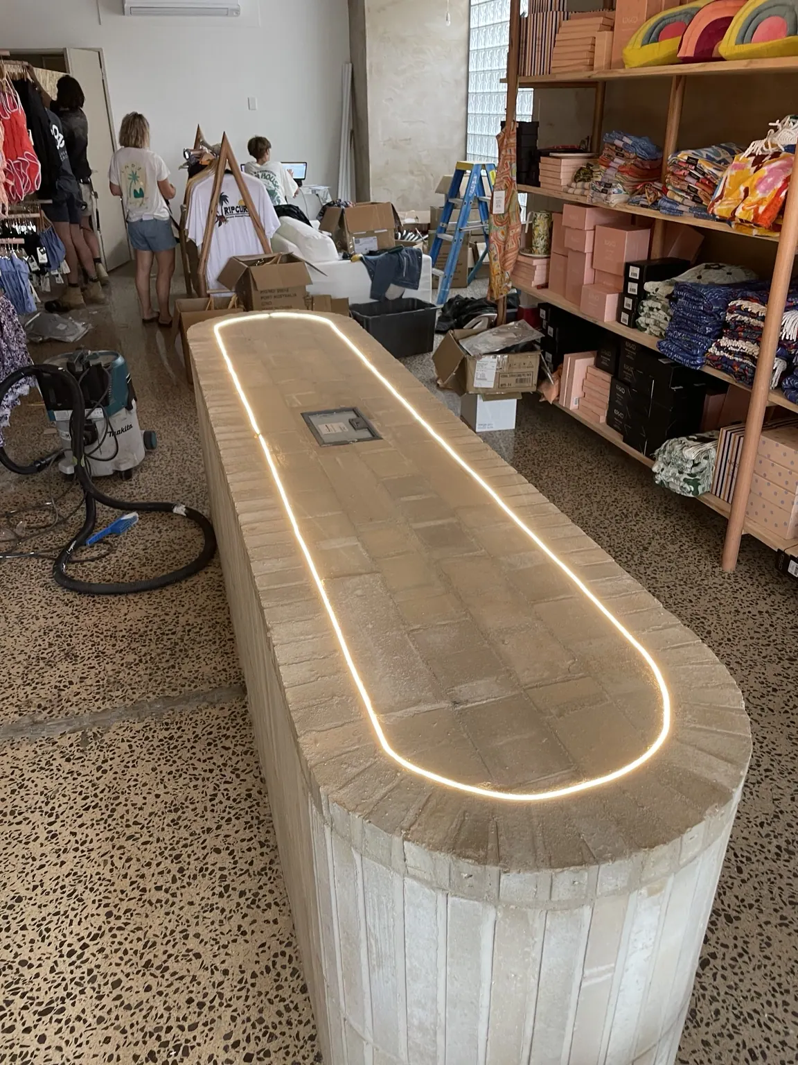 Curved brick retail counter — Reid Bricklaying